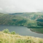 Mt. St. Helens in Washington erupted in 1980, blowing its top off 16 years before this photo was taken. Many of the conifers are starting to grow back.