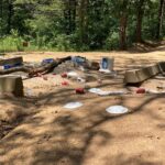 Campsites at state parks and fishing areas are frequently left littered by campers when they leave (south central Oklahoma).