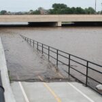 In 2019 the Arkansas River in Tulsa flooded many areas because of heavy rainfall upstream, and because the eroded soil upstream could not absorb additional rain water.
