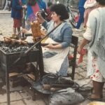 Cuy, anyone? A street vendor in a Quechua mountain village in Ecuador sells roasted guinea pig and potatoes in 1989.
