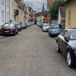 If you don't like my driving, then stay off the sidewalk! Schiltigheim, north of Strasbourg. Sidewalk parking is legal on these narrow streets.