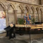Votive candles in the Cathedral at Strasbourg. The candles do the praying for the people: "St. Mary, mother of God, pray for us poor sinners, now and at the hour of our death."