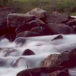 Slow exposure of Rapid Creek near Hisega in the Black Hills of South Dakota. Photo by Stan Rice.