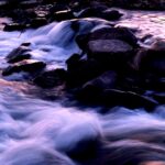 Slow exposure of Rapid Creek near Hisega in the Black Hills of South Dakota. Photo by Stan Rice.