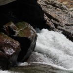 Although the upper foothill shrublands of the Sierra Nevada in California receive little rain in the summer, the Kaweah River rushes with water from snowmelt.