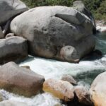 Although the upper foothill shrublands of the Sierra Nevada in California receive little rain in the summer, the Kaweah River rushes with water from snowmelt.