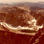 A snowmelt lake as seen from the top of Mt. Whitney, the tallest mountain in the lower 48. Sequoia National Park, California. This is the highest lake in the lower 48.