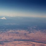 Mt. St,. Helens and Mount Adams in the Cascades, aerial view, north of the Columbia River.
