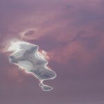 The bed of the Great Salt Lake, seen from the air, is red because of photosynthetic microbes.